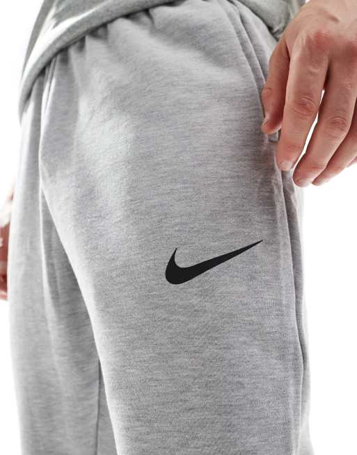 Nike Training Dri FIT tapered fleece joggers in grey ASOS