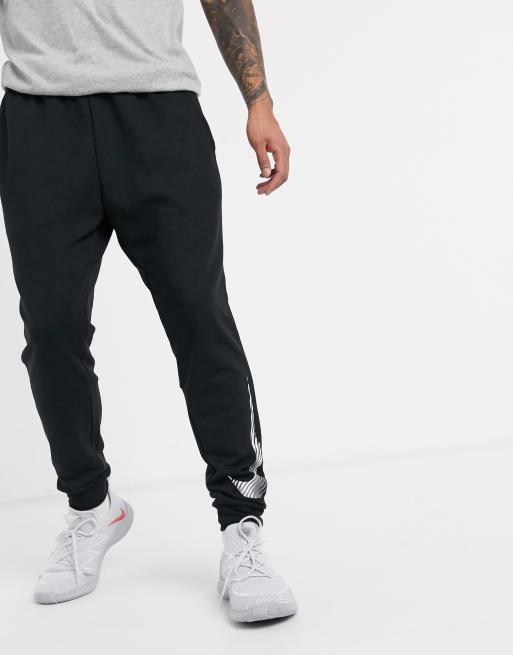 Nike Training Dri-Fit tapered joggers in black | ASOS