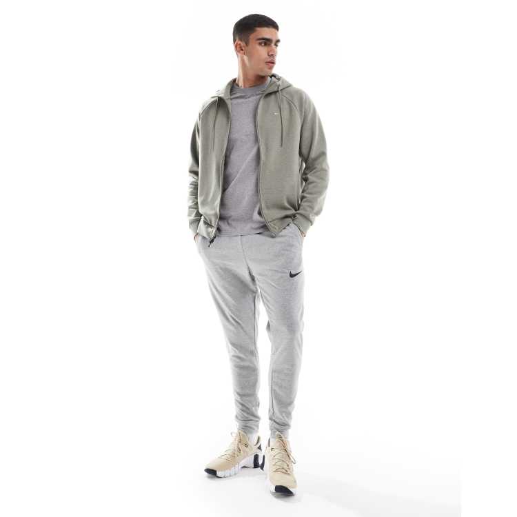 Nike Training Dri-FIT tapered joggers in light grey