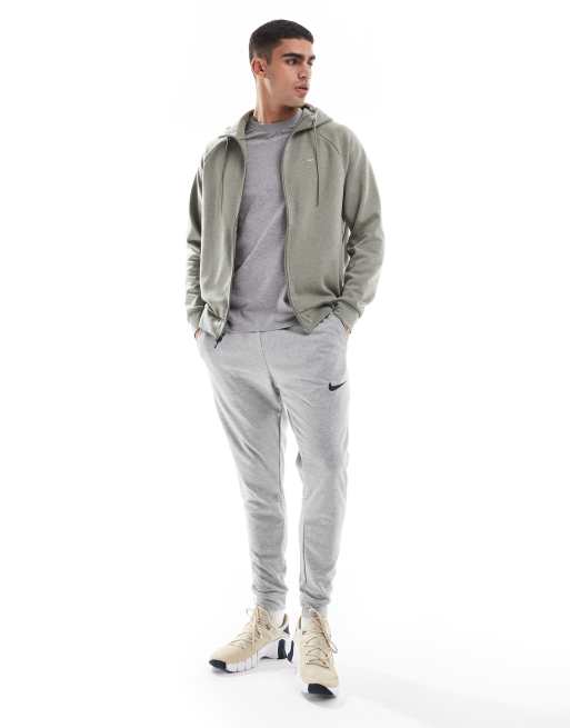 Nike Training Dri FIT tapered joggers in light grey ASOS