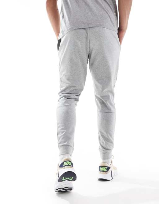 Nike Training Dri-FIT tapered joggers in light grey