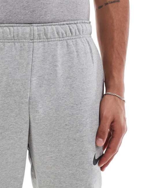 Nike Training Dri-FIT tapered joggers in light grey