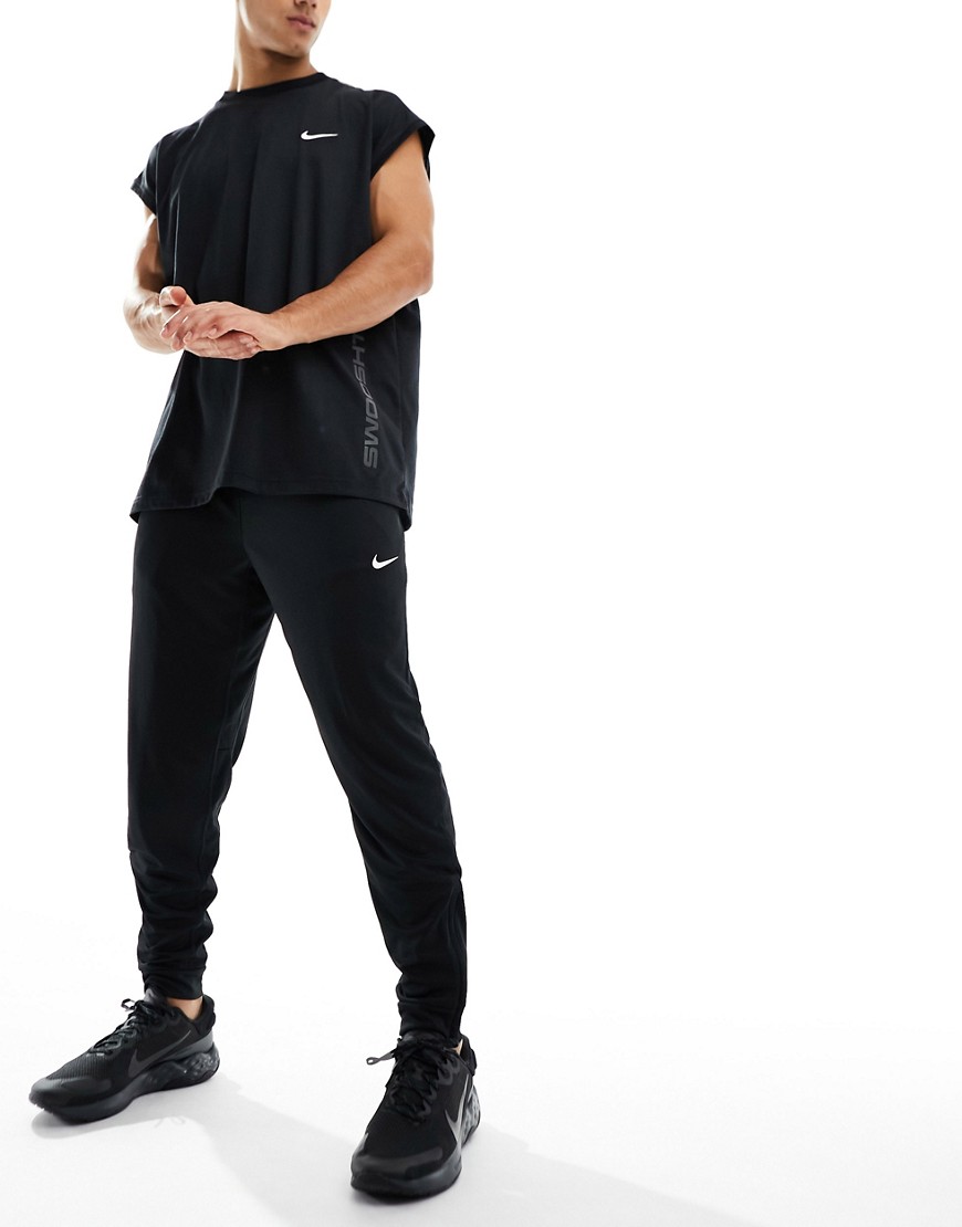 Shop Nike Training Dri-fit Totality Tapered Sweatpants In Black