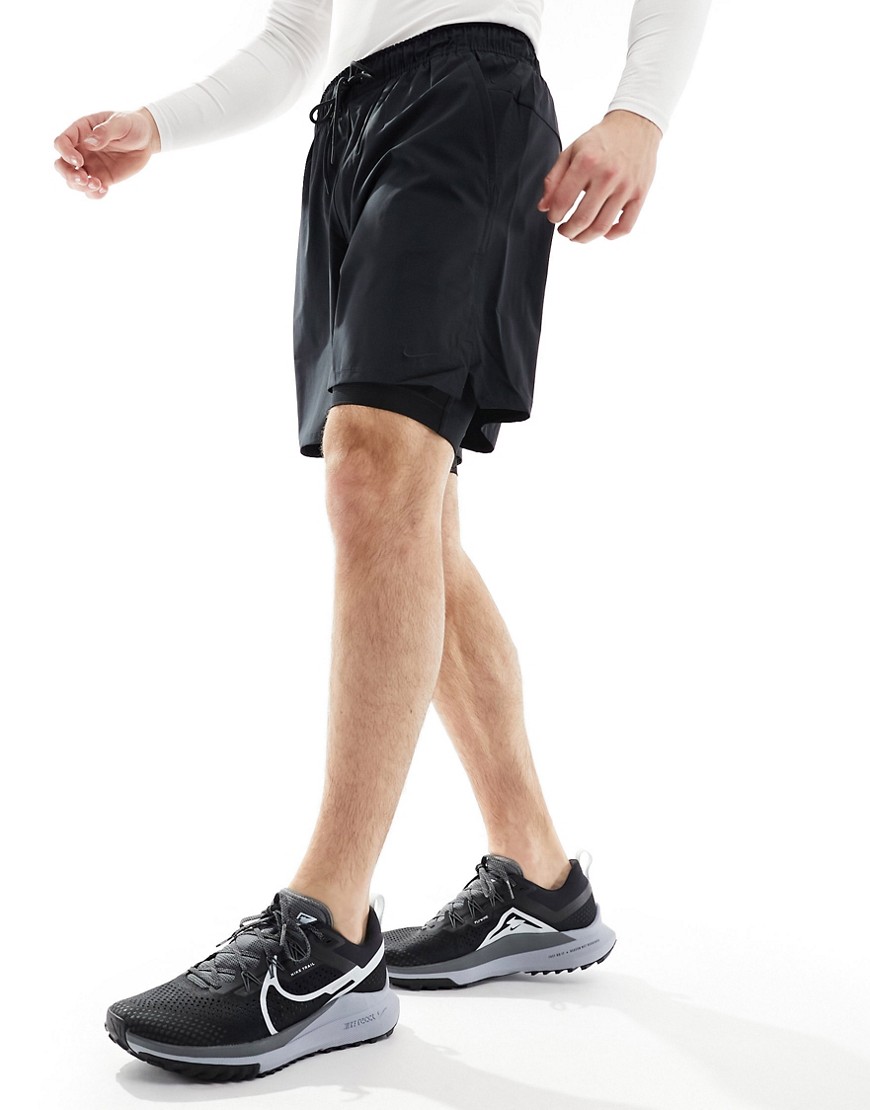 Shop Nike Dri-fit Unlimited Woven 7in 2 In 1 Shorts In Black