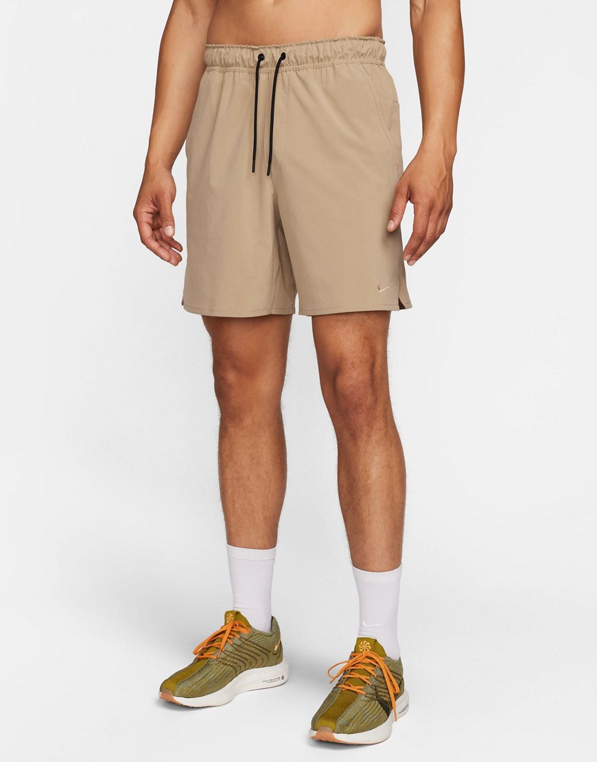 Shop Nike Training Dri-fit Unlimited Woven 7inch Shorts In Beige-green