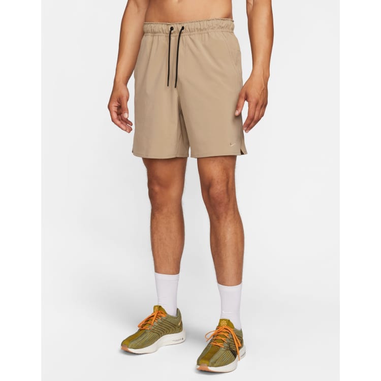 Nike Training Dri FIT Unlimited woven 7inch shorts in beige ASOS