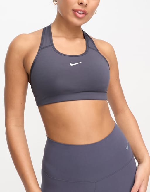 Nike Training – Dri-FIT – Wattierter Sport-BH in Grau mit Logo und leichter Stützfunktion