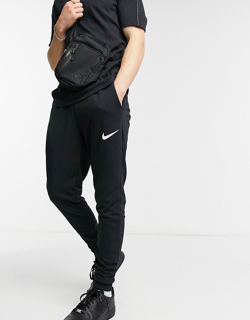 Nike Training Dry tapered fleece joggers in black