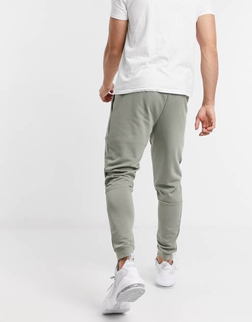 Nike Training Dry tapered fleece joggers in khaki ASOS