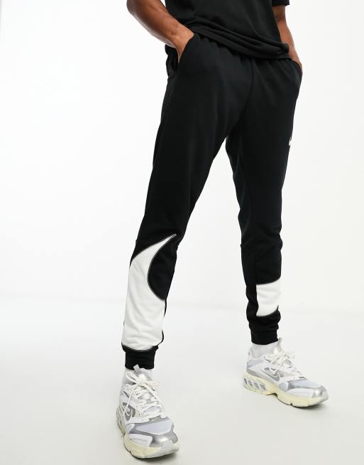 Nike Training – Energy – Svarta mjukisbyxor med tejpad Swoosh-logga