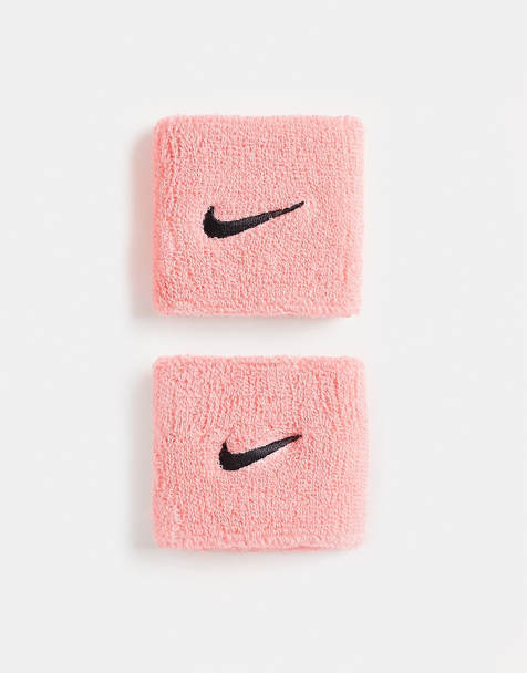 Nike Training - Fasce da polso unisex con logo Nike rosa - view 1
