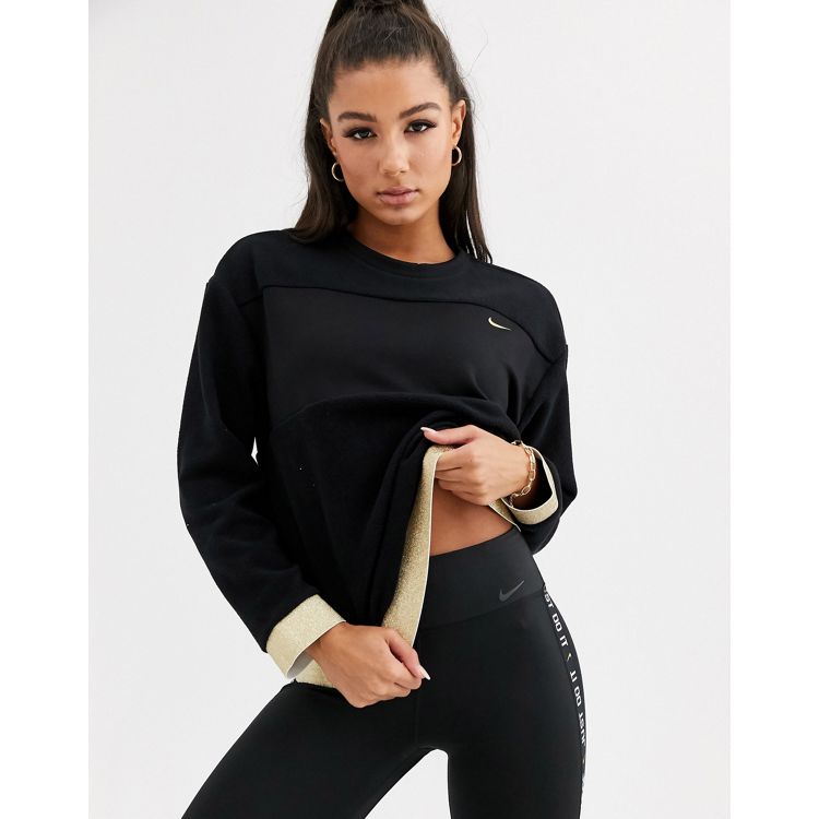 Nike Training fleece long sleeve top with gold sparkle trim