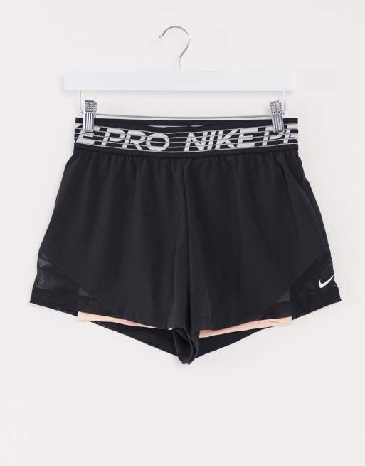 Nike Training flex 2 in 1 shorts in black and pink