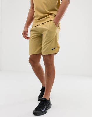 nike shorts gold