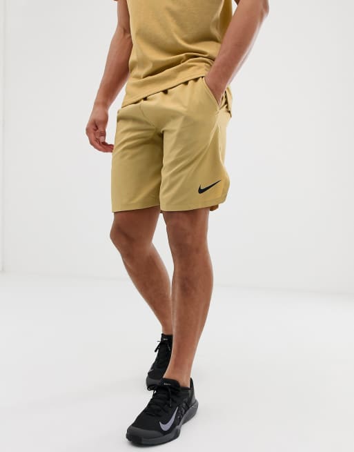 Nike store shorts gold