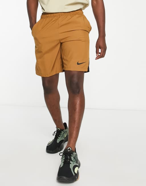 Nike Training Flex woven 9 inch shorts in orange