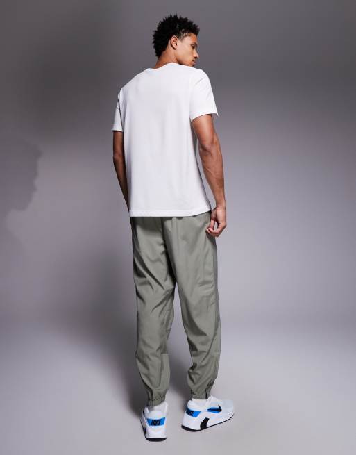 Nike Training Form Dri-FIT joggers in green, 3 of 5