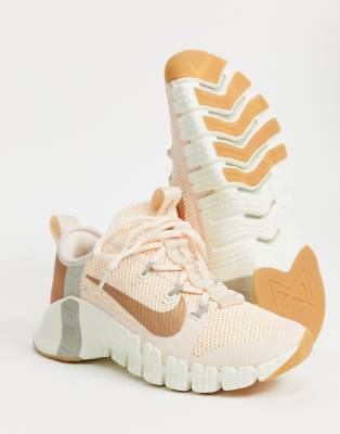 peach nike trainers