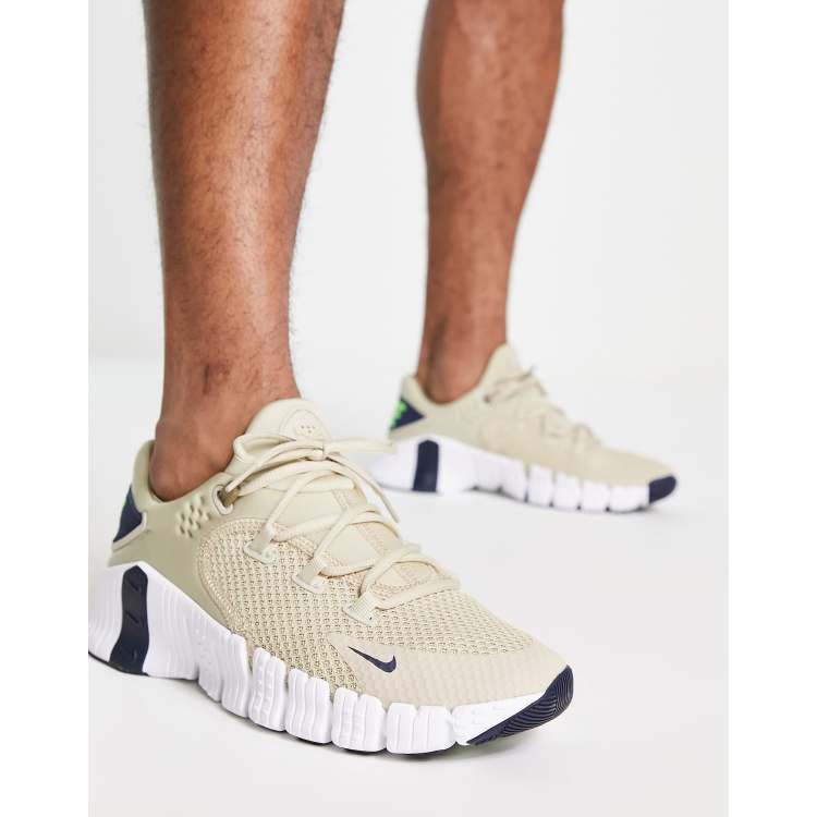 Nike Training Free Metcon 4 Sneakers in gebroken wit ASOS