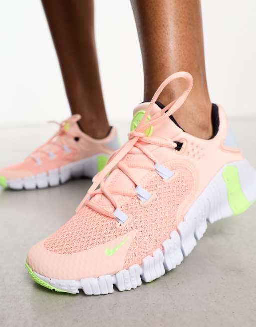 Nike Training Free Metcon 4 sneakers in peach