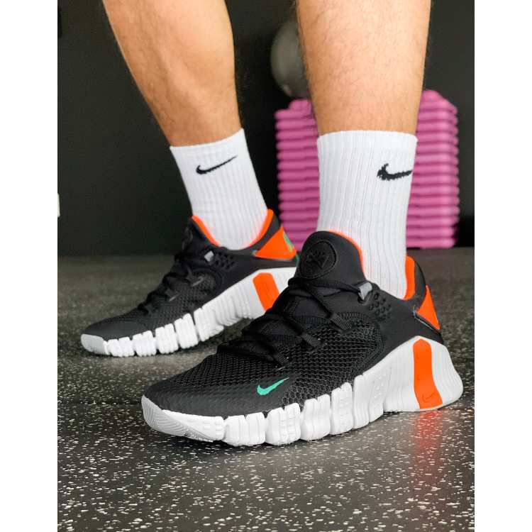 Nike metcon 4 hot sale black and pink