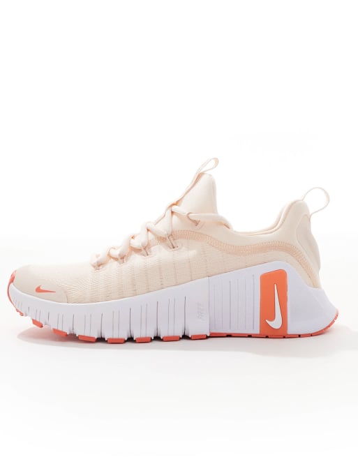 Nike training metcon sneakers in white and orange hotsell