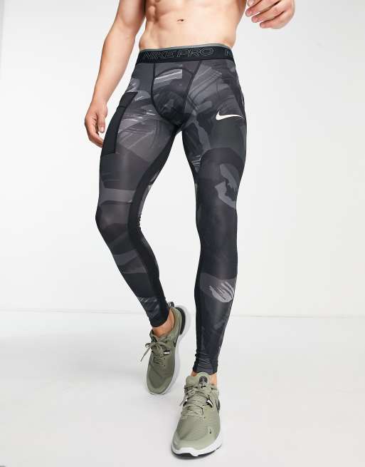 Nike Training glitch camo dri-fit leggings in black | ASOS