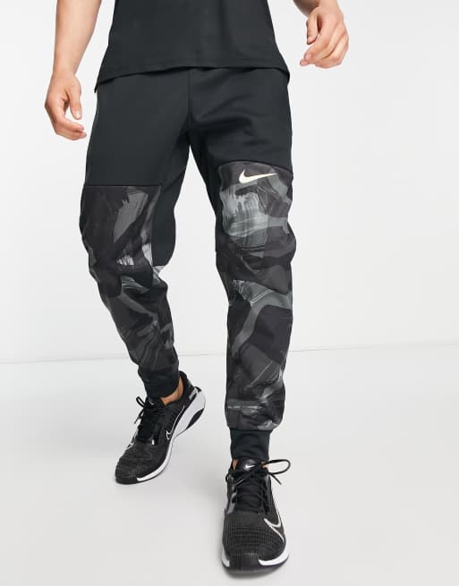 Nike black 2025 camo tracksuit