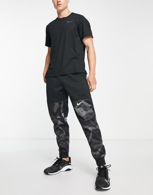 Nike black 2025 camo tracksuit