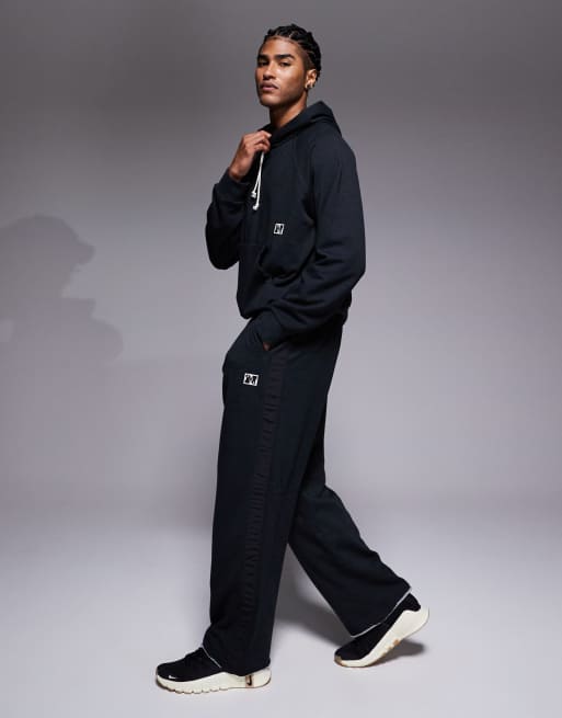 Nike Training Heritage Dri-FIT joggers in black, 3 of 5