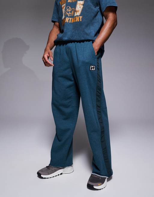 Nike Training Heritage Dri-FIT joggers in blue
