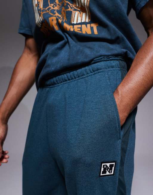 Nike Training Heritage Dri-FIT joggers in blue, 4 of 5
