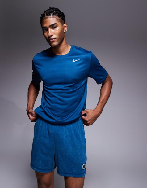 Nike Training Heritage Dri-Fit shorts in blue