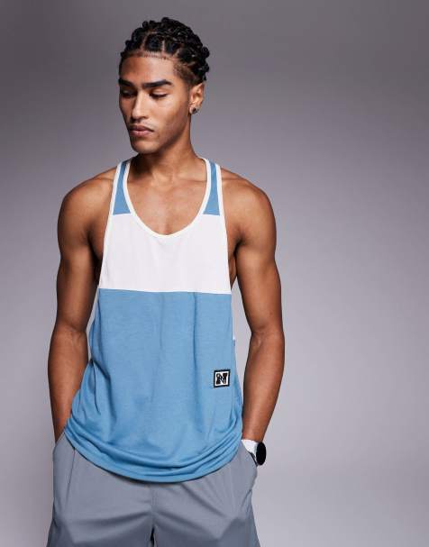 Nike Training Heritage Dri-FIT vest in blue and white
