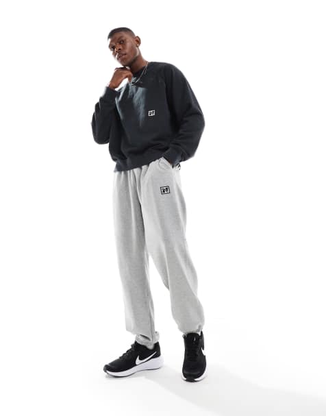 Nike Training Heritage fleece joggers in grey - view 1