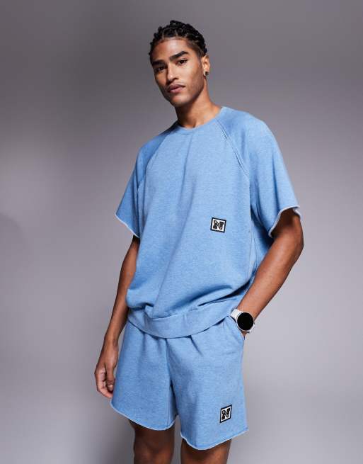 Nike Training Heritage fleece short sleeve top in blue