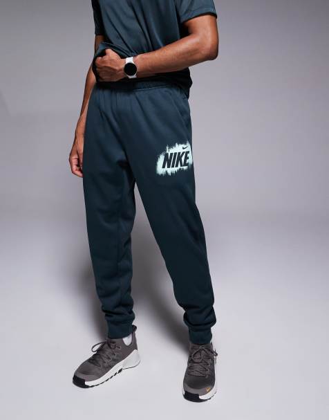Nike Training Heritage joggers in green