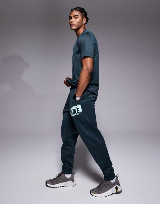 Nike Training - Heritage - Joggingbroek in groen, 3 van 5