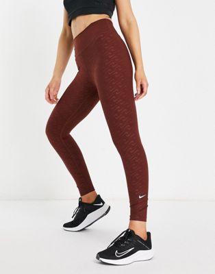 Nike Training Icon Clash Dri-FIT One Luxe 7/8 all over print leggings in bronze