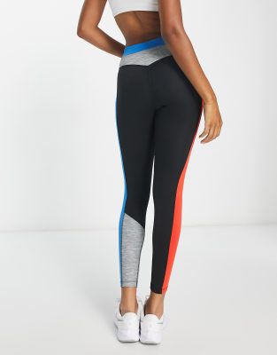 Nike Training Icon Clash leggings in black and gold | ASOS