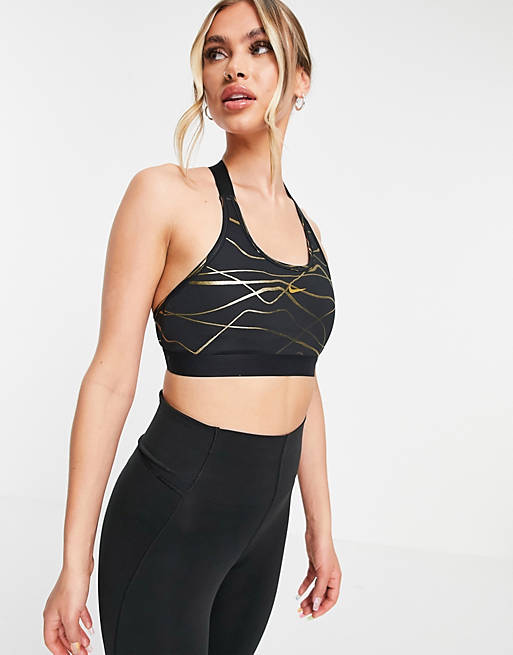 Nike Training Icon Clash medium support bra in black and gold