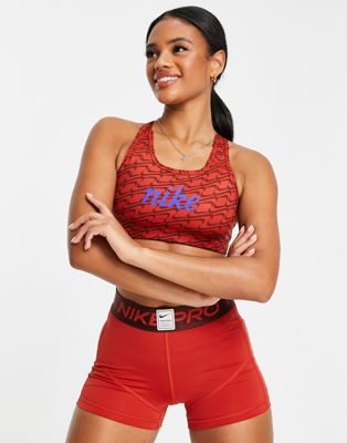 Nike Training Icon Clash Swoosh AOP graphic medium support sports bra in red