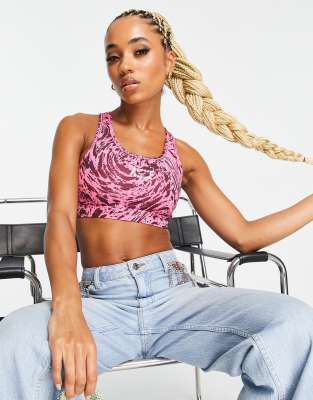 Nike Training Icon Clash Swoosh Dri-FIT strappy printed medium support  sports bra in pink