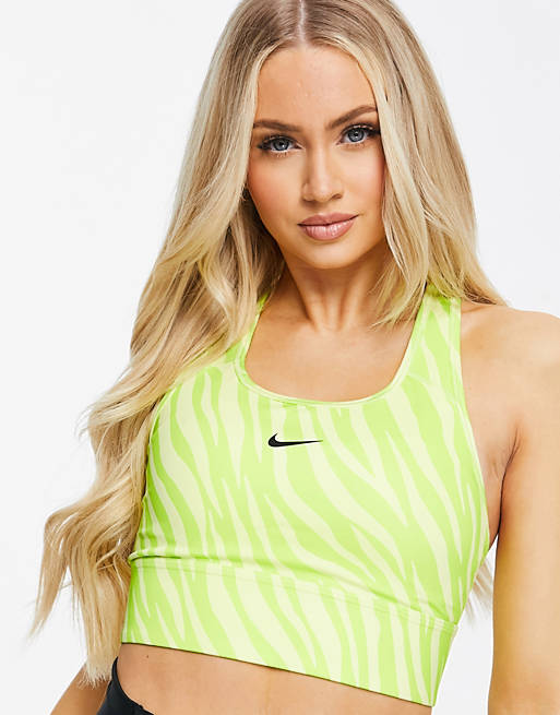 Women Nike Training Icon Clash Swoosh mid support bra in yellow zebra print 