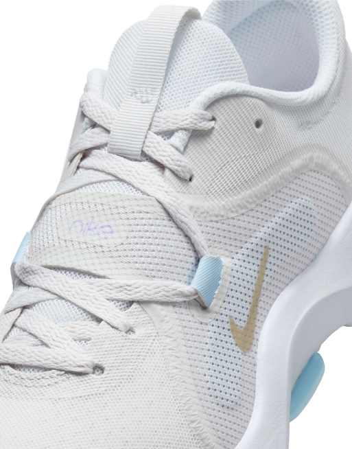 Nike Training In-Season 13 sneakers in white, light blue and gold