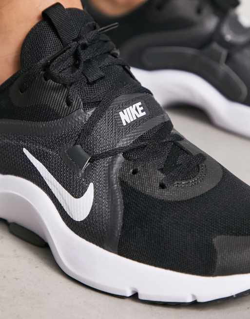 Black and white store nikes with strap