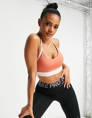 Nike Training Indy Dri-FIT logo band light support sports bra in rose pink