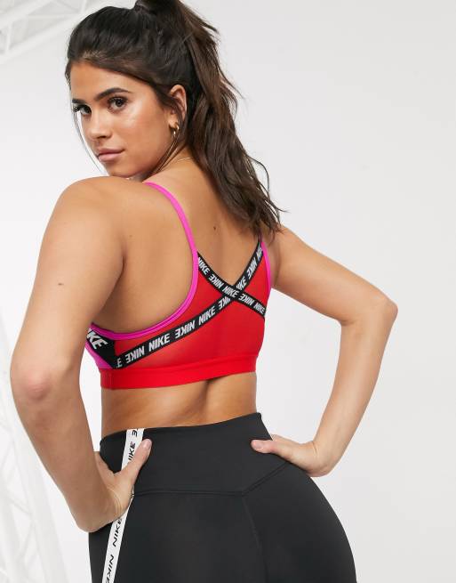 Nike Training Indy logo taped bra in pink ASOS