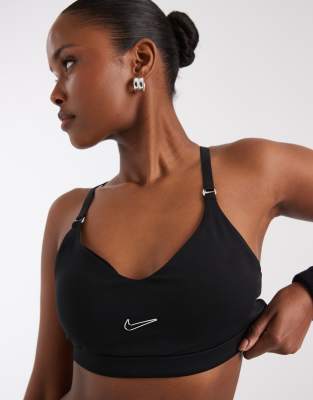 Nike Training Indy metallic swoosh light support sports bra in black