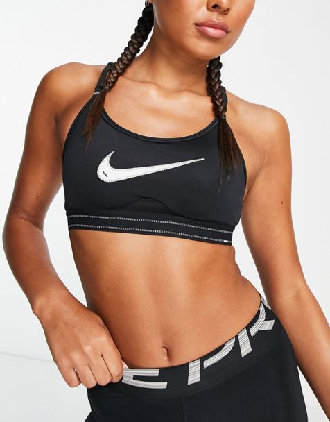 Nike Training – Swoosh Dri-FIT – Sport-BH in Schwarz mit Logo,  Leopardenmuster und mittlerer Stützfunktion